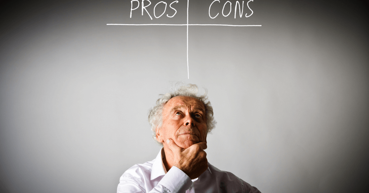 Man thinking with pros and cons chart above head